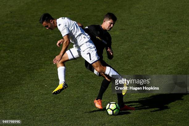 Cameron Howieson of Auckland City FC and Mario Ilich of Team Wellington compete for the ball during leg one of the OFC Champions League 2018...