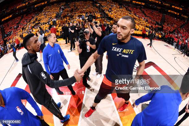 Josh Huestis of the Oklahoma City Thunder and Rudy Gobert of the Utah Jazz exchange handshakes at the begging of Game Three of Round One of the 2018...