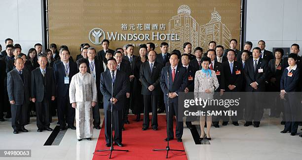 Taiwan top envoy Chiang Pin-kung speaks as his Chinese counterpart Chen Yunlin listens during a ceremony at a local hotel in the central Taiwanese...