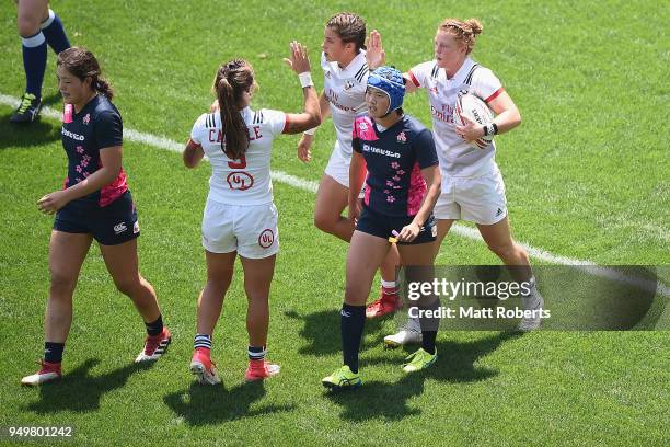 Leyla Alev Kelter of USA celebrates scoring a try with team mates on day two of the HSBC Women's Rugby Sevens Kitakyushu Trophy Semi-final match...