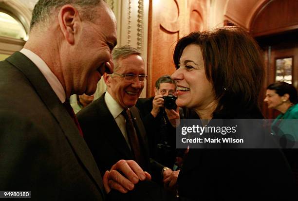 Senate Majority Leader Harry Reid , Sen. Charles Schumer , and Victoria Reggie Kennedy react after the Senate passed procedural vote on health care...