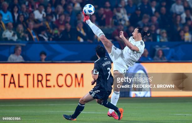 Zlatan Ibrahimovic of LA Galaxy vies for the ball with Michael Parkhurt s of Atlanta United during their Major League Soccer match in Carson,...