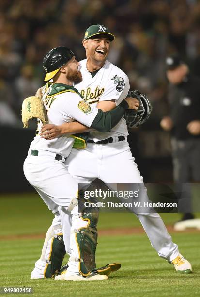 Sean Manaea and Jonathan Lucroy of the Oakland Athletics celebrates after Manaea pitched a no-hitter against the Boston Red Sox at the Oakland...