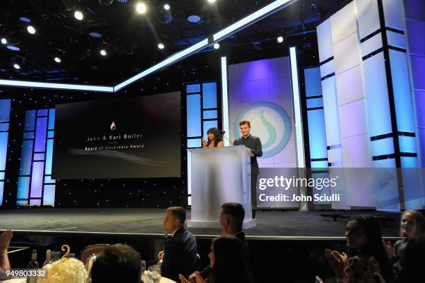 Monique Coleman and Garrett Clayton speak onstage during The Thirst Project's 9th Annual Thirst Gala at The Beverly Hills Hotel on April 21, 2018 in...