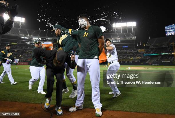 Sean Manaea of the Oakland Athletics gets a pie in the face by a teammate after Manaea threw a no-hitter against the Boston Red Sox at the Oakland...