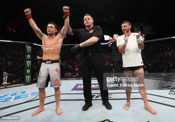 Frankie Edgar celebrates after his victory over Cub Swanson in their featherweight fight during the UFC Fight Night event at the Boardwalk Hall on...