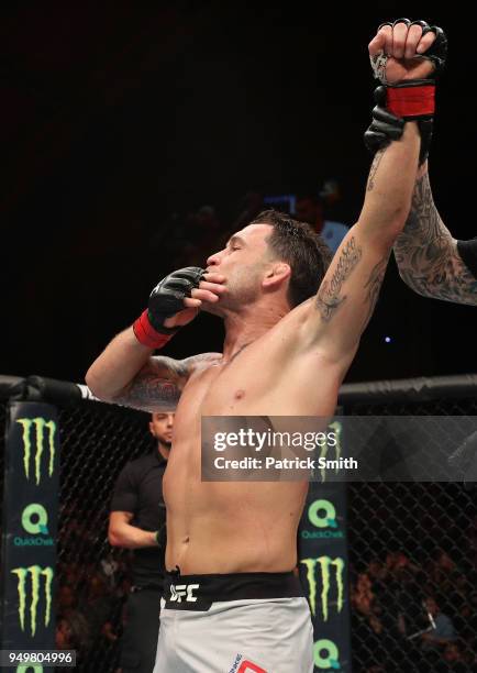 Frankie Edgar celebrates after his victory over Cub Swanson in their featherweight fight during the UFC Fight Night event at the Boardwalk Hall on...