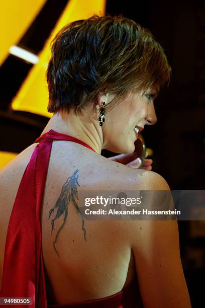 Maria Riesch winner of the 3rd place female 'Athlete of the Year' award poses after the 'Athlete of the Year' gala at the Kurhaus Baden-Baden on...