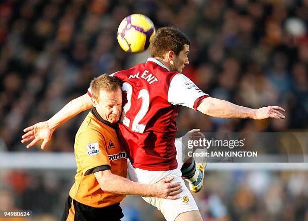 Burnley's David Nugent vies with Wolverhampton Wanderers Steven Caldwell during a Premier League match at Molineux Stadium in Wolverhampton , West...