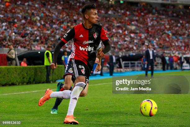 Ulises Cardona of Atlas controls the ball during the 16th round match between Atlas and Chivas as part of the Torneo Clausura 2018 Liga MX at Jalisco...