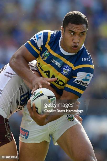 Peni Terepo of the Eels is tackled during the round seven NRL match between the Parramatta Eels and the Manly Sea Eagles at ANZ Stadium on April 22,...