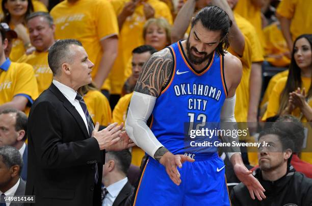 Head coach Billy Donovan of the Oklahoma City Thunder talks to Steven Adams during Game Three of Round One of the 2018 NBA Playoffs against the Utah...