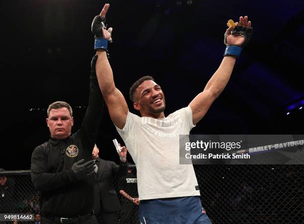 Kevin Lee celebrates after his TKO victory over Edson Barboza of Brazil in their lightweight fight during the UFC Fight Night event at the Boardwalk...
