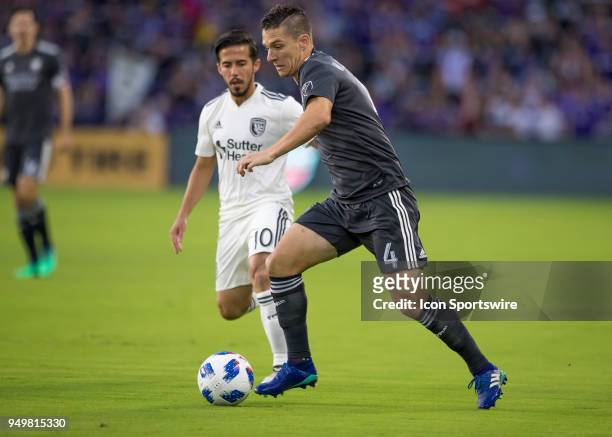 Orlando City midfielder Will Johnson passes the ball during the MLS soccer match between the Orlando City FC and the San Jose Earthquakes at Orlando...