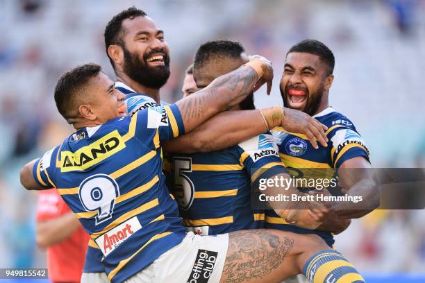 Michael Jennings of the Eels celebrates scoring a try with team mates during the round seven NRL match between the Parramatta Eels and the Manly Sea...