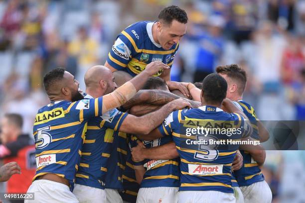 Corey Norman of the Eels celebrates scoring a try with team mates during the round seven NRL match between the Parramatta Eels and the Manly Sea...