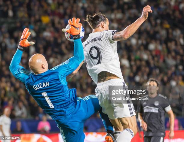 Zlatan Ibrahimovic of Los Angeles Galaxy battles Brad Guzan of Atlanta United during the Los Angeles Galaxy's MLS match against Atlanta United FC at...