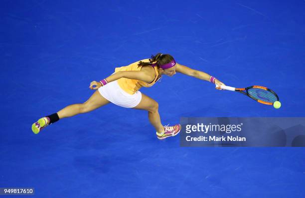 Quirine Lemoine of the Netherlands plays a forehand in her match against Daria Gavrilova of Australia during the World Group Play-Off Fed Cup tie...