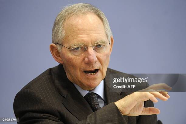Picture taken on December 16, 2009 shows German Finance Minister Wolfgang Schaeuble addressing a press conference after unveiling the federal budget...