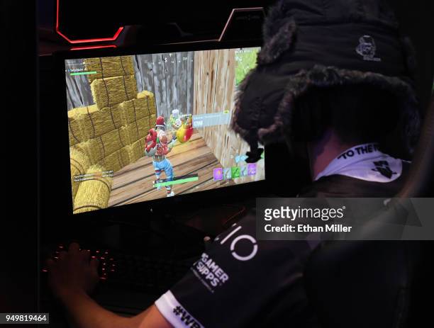 Gamer plays "Fortnite" against Twitch streamer and professional gamer Tyler "Ninja" Blevins during Ninja Vegas '18 at Esports Arena Las Vegas at...
