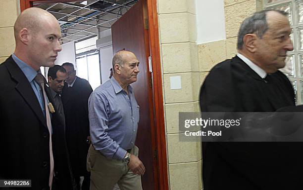Former Israeli Prime Minister Ehud Olmert arrives at the District Court on December 21, 2009 in Jerusalem, Israel. Olmert and his former Bureau Chief...
