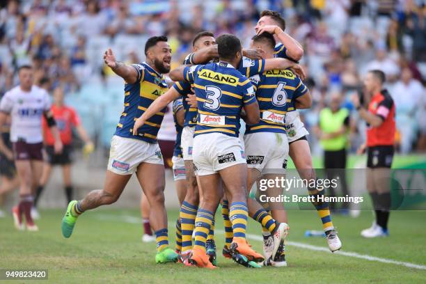 Corey Norman of the Eels celebrates scoring a try with team mates during the round seven NRL match between the Parramatta Eels and the Manly Sea...