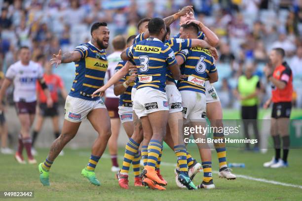 Corey Norman of the Eels celebrates scoring a try with team mates during the round seven NRL match between the Parramatta Eels and the Manly Sea...