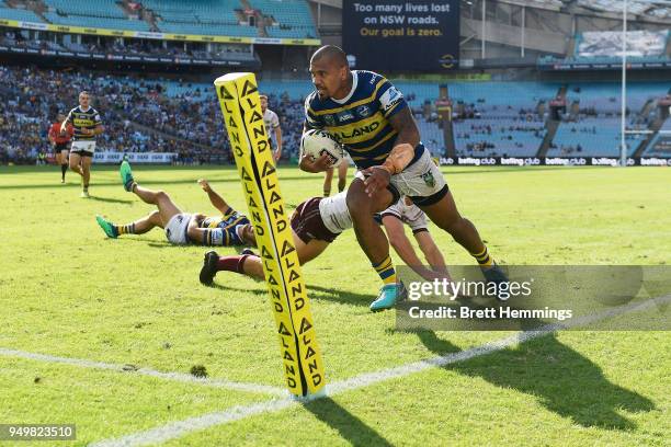 Manu Ma'u of the Eels scores a try during the round seven NRL match between the Parramatta Eels and the Manly Sea Eagles at ANZ Stadium on April 22,...