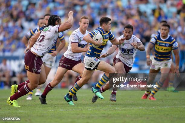 Mitchell Moses of the Eels makes a break during the round seven NRL match between the Parramatta Eels and the Manly Sea Eagles at ANZ Stadium on...