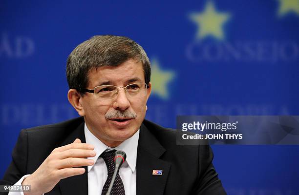Turkey's Foreign Minister Ahmet Davutoglu speaks during a joint press conference after a meeting concerning Turkey's accession to the EU at the EU...