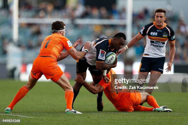 Tevita Kuridrani of the Brumbies is tackled by Matias Orlando of the Jaguares during the round 10 Super Rugby match between the Brumbies and the...