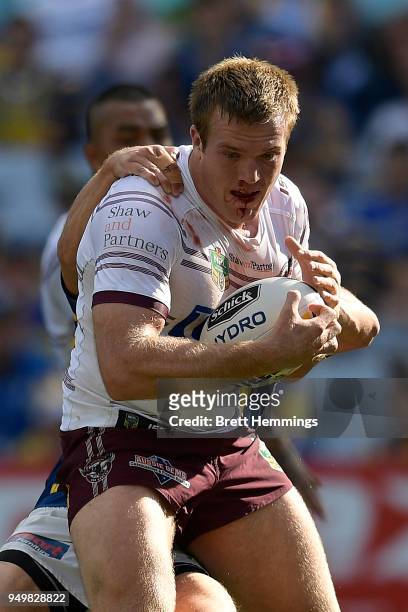 Jake Trbojevic of Manly is tackled during the round seven NRL match between the Parramatta Eels and the Manly Sea Eagles at ANZ Stadium on April 22,...