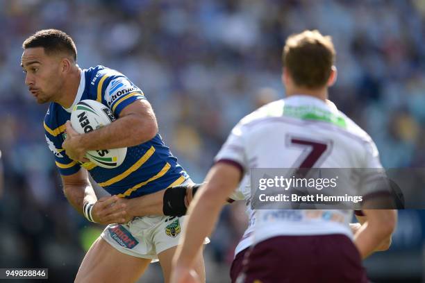 Corey Norman of the Eels is tackled during the round seven NRL match between the Parramatta Eels and the Manly Sea Eagles at ANZ Stadium on April 22,...