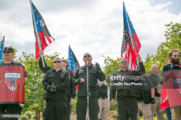 Neo-Nazi speaks during a National Socialist Movement rally at Greenville Street Park in Newnan, Georgia, USA on April 21, 2018.