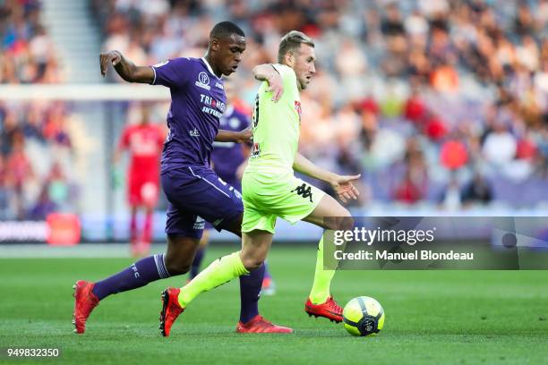 Issa Diop of Toulouse and Flavien Tait of Angers during the Ligue 1 match between Toulouse and Angers SCO at Stadium Municipal on April 21, 2018 in...