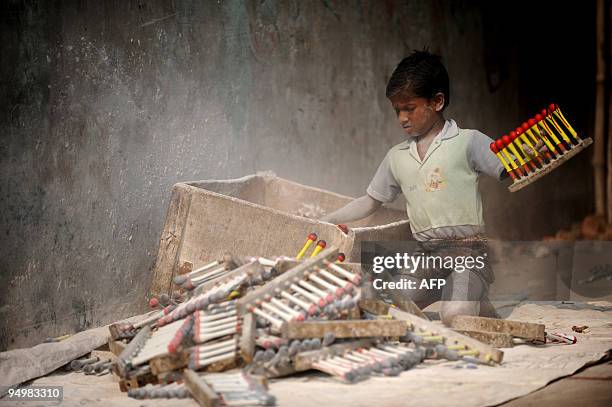 Bangladeshi youth works in a balloon factory in Dhaka on December 17, 2009. In 2002-2003, The Bangladesh Bureau of Statistics conducted the second...