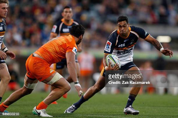 Chance Peni of the Brumbies runs with the ball during the round 10 Super Rugby match between the Brumbies and the Jaguares at University of Canberra...