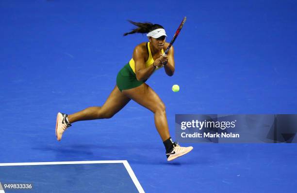 Destanee Aiava of Australia plays a backhand in hermatch with Daria Gavrilova of Australia against Lesley Kerkhove and Demi Schuurs of the...