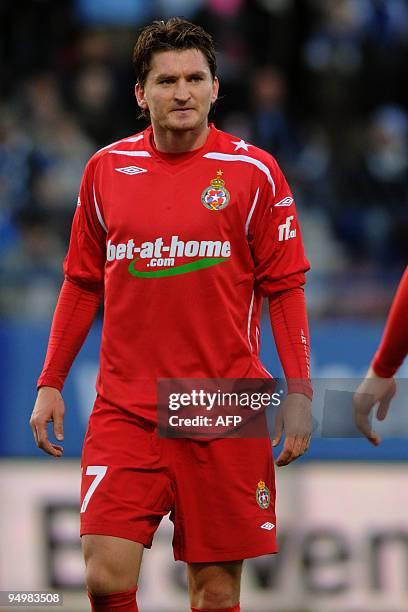 Wisla Krakow's Andraz Kirm takes part in a fooball match on October 18, 2009 in Wronki. AFP PHOTO / LUDMILA MITREGA