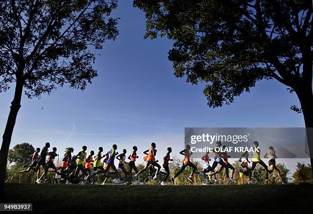 Runners take part in the 34th Amsterdam Marathon on October 18, 2009 near Amsterdam. Gilbert Yegon of Kenya won in 2 hours, 6 minutes and 18 seconds....