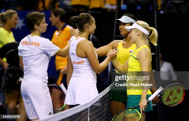 Destanee Aiava and Daria Gavrilova of Australia shake hands with Lesley Kerkhove and Demi Schuurs of the Netherlands after the doubles match during...