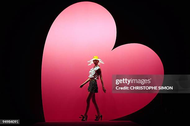 Model displays a creation of Moschino Cheap and Chic Spring/Summer 2010 ready-to-wear fashion show on September 24, 2009 during the Women's fashion...