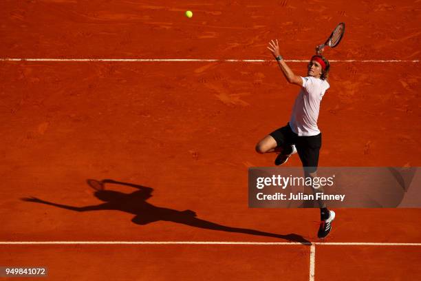 Alexander Zverev of Germany goes for a smash against Kei Nishikori of Japan during day seven of the ATP Masters Series Monte Carlo Rolex Masters at...