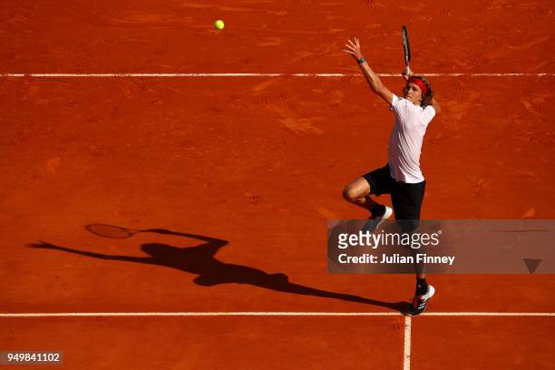 Alexander Zverev of Germany goes for a smash against Kei Nishikori of Japan during day seven of the ATP Masters Series Monte Carlo Rolex Masters at...