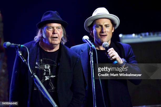 Neil Young and Chris Stills perform during the 5th Annual Light Up The Blues Concert an Evening of Music to Benefit Autism Speaks at Dolby Theatre on...