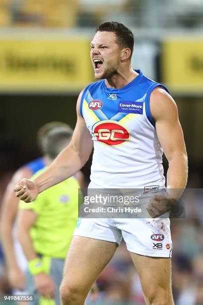 Steven May of the Suns celebrates a goal during the round five AFL match between the Brisbane Lions and the Gold Coast Suns at The Gabba on April 22,...