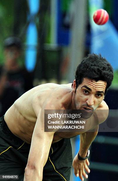 Pakistani cricketer Umar Gul delivers a ball during a practice session at the P. Saravanamuttu Stadium in Colombo on July 11, 2009. Sri Lanka...