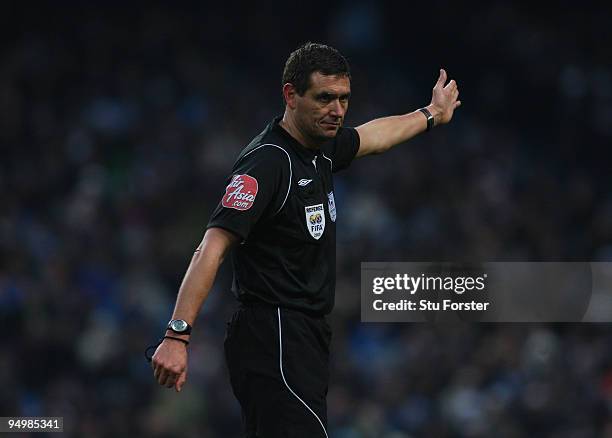 Referee Andre Marriner in action during the Barclays Premier League game between Manchester City and Sunderland at City of Manchester Stadium on...