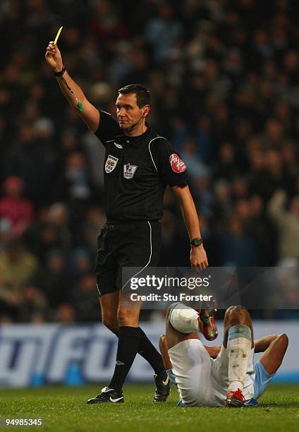 Referee Andre Marriner in action during the Barclays Premier League game between Manchester City and Sunderland at City of Manchester Stadium on...