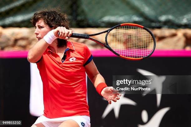 Carla Suarez Navarro of Spain in action in her match against Veronica Cepede Royg of Paraguay during day one of the Fedcup World Group II Play-offs...